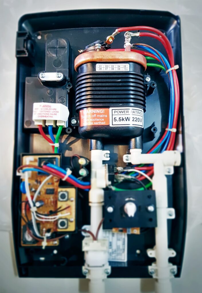 Close-up Electrical Wiring and Circuit of Water Heater for Showering with Selective Focus